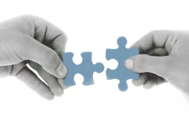 Two hands holding a puzzle piece in collaboration. Illustration.